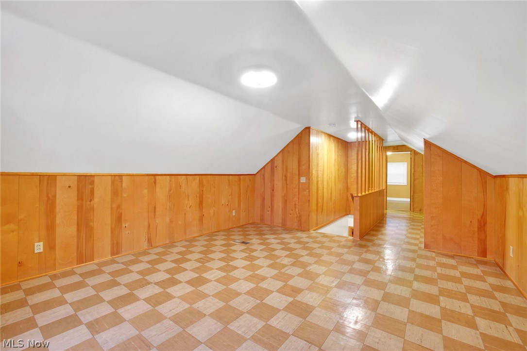 4820 15th Street Northwest Canton, OH 44708 - Photo 19 of 28 Bedroom with wood walls, and lofted ceiling