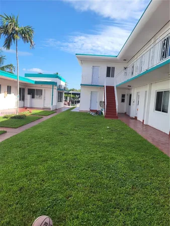a house view with a garden space