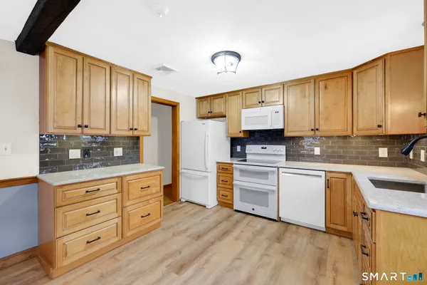 $309,900 | 61 Linwood Drive, East Hartford, CT 06118
