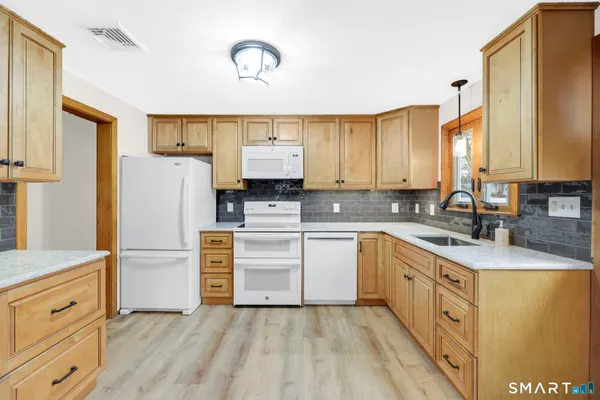 $309,900 | 61 Linwood Drive, East Hartford, CT 06118