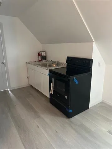 a utility room with washer and dryer