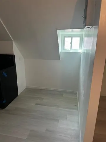 en empty room with windows