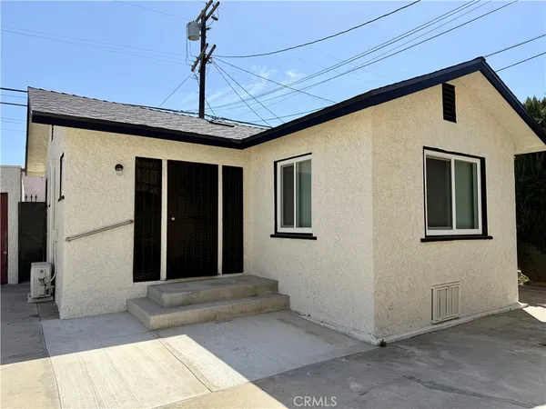 a front view of a house with a hallway