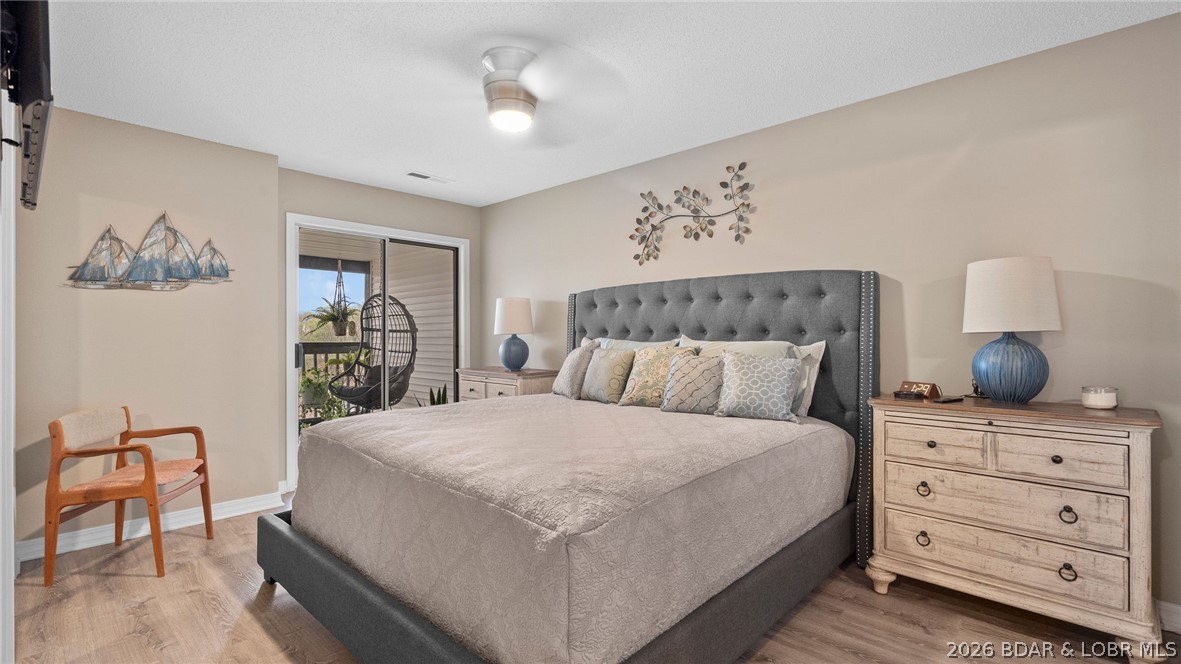 1580 Cherokee Road, Unit 2A Lake Ozark, MO 65049 - Photo 14 of 49 Main Level Primary with bath