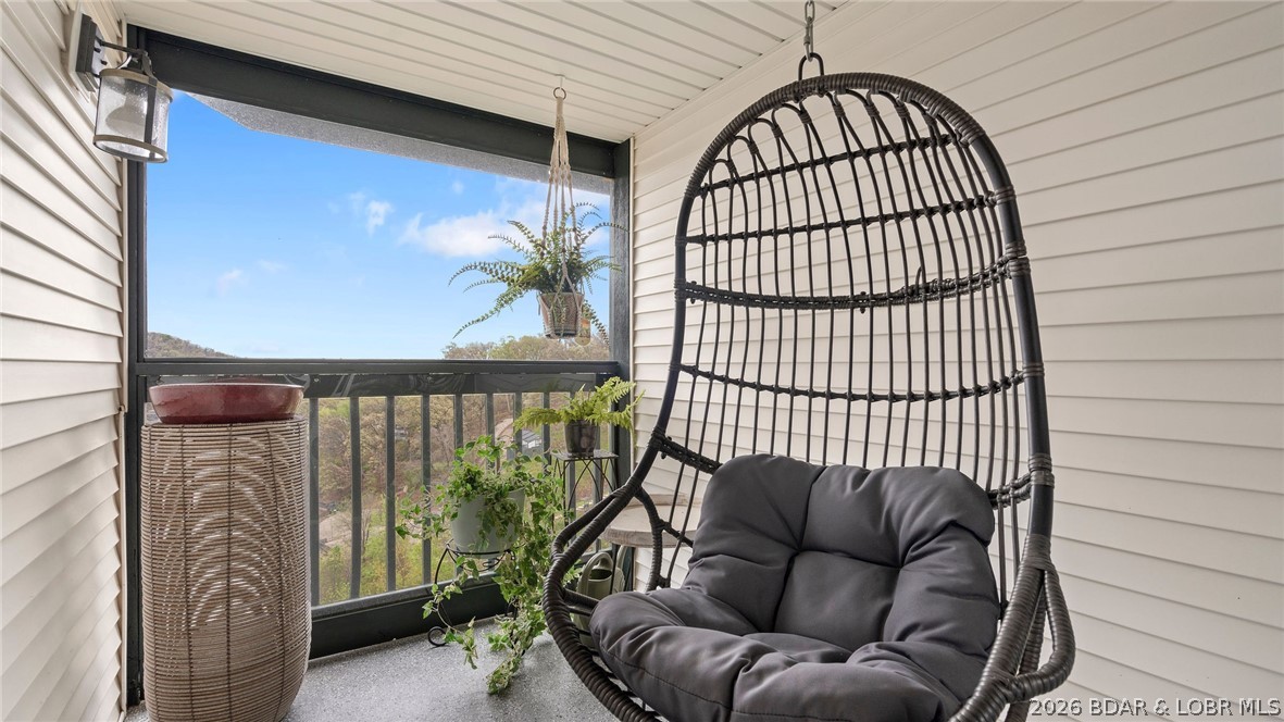 1580 Cherokee Road, Unit 2A Lake Ozark, MO 65049 - Photo 26 of 49 Screened in deck off of bedroom