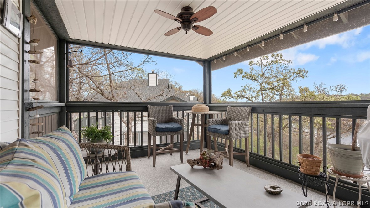 1580 Cherokee Road, Unit 2A Lake Ozark, MO 65049 - Photo 28 of 49 2nd Screened in deck off of dining area