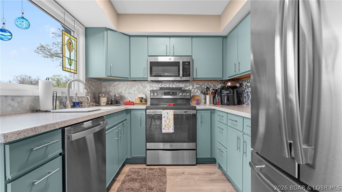 1580 Cherokee Road, Unit 2A Lake Ozark, MO 65049 - Photo 7 of 49 Kitchen- Main Level