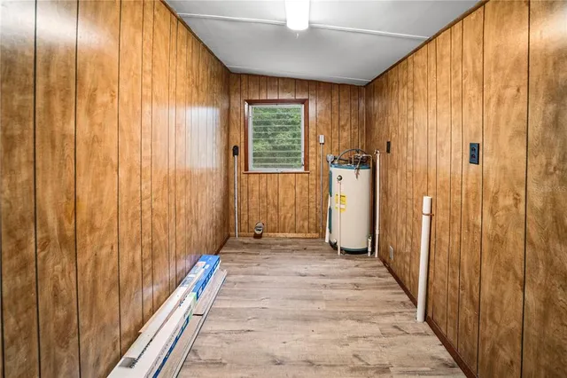 a view of a bathroom with shower and a window