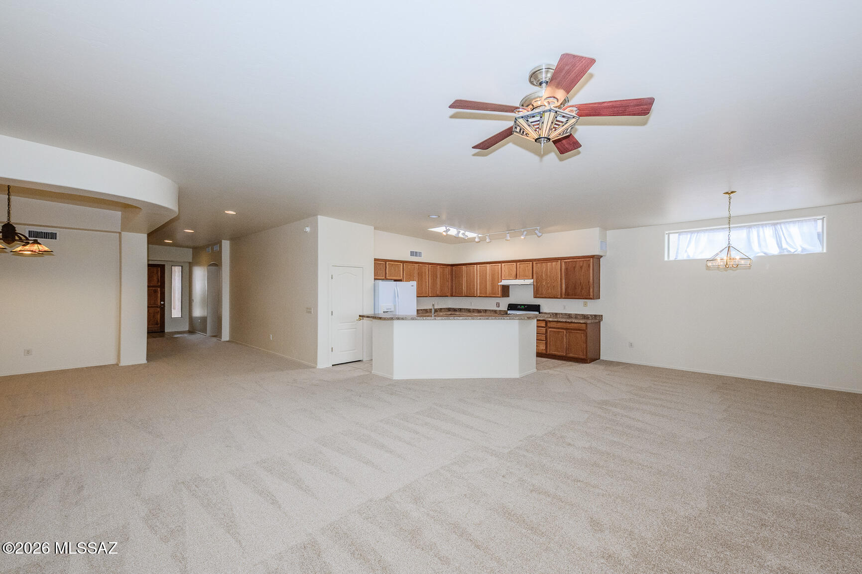13588 East High Plains Ranch Street Vail, AZ 85641 - Photo 11 of 44 Great room towards kitchen