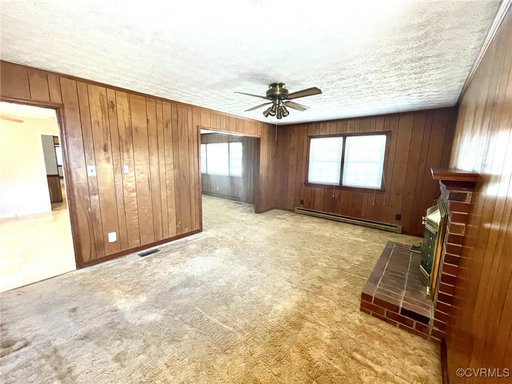 2930 Delfin Road Midlothian, VA 23112 - Photo 6 of 17 Family room featuring a ceiling fan and carpet flo