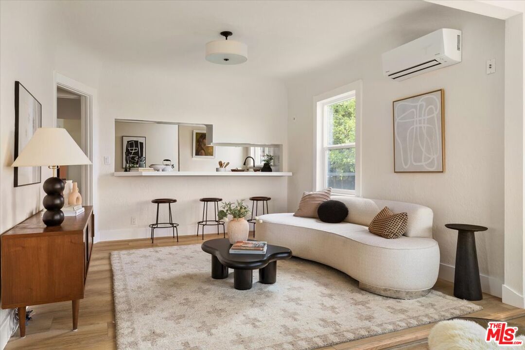 621 Isabel Street Los Angeles, CA 90065 - Photo 6 of 38 a living room with furniture and a window