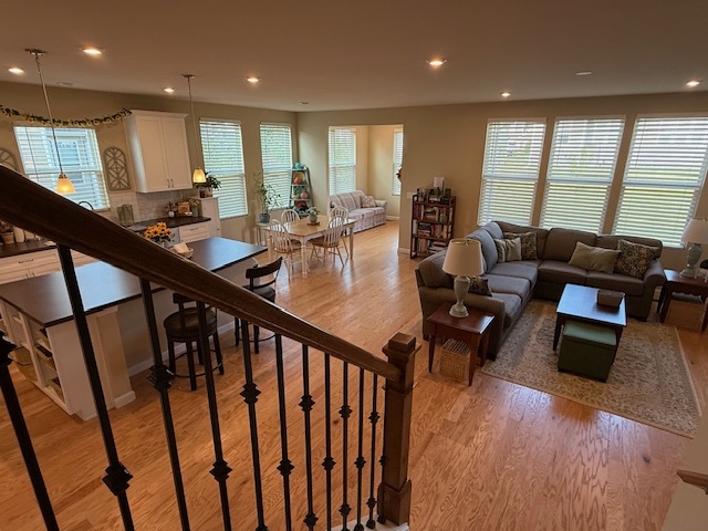 580 North Highlander Way Addison, IL 60101 - Photo 11 of 63 a living room with furniture window and wooden floor