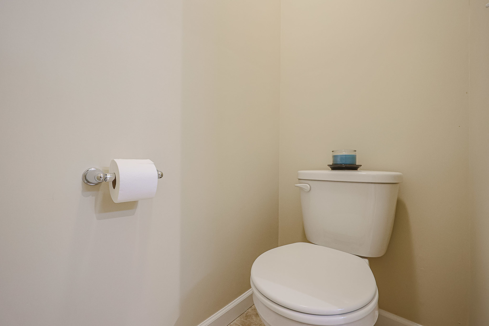 580 North Highlander Way Addison, IL 60101 - Photo 27 of 63 a white toilet sitting next to a white wall