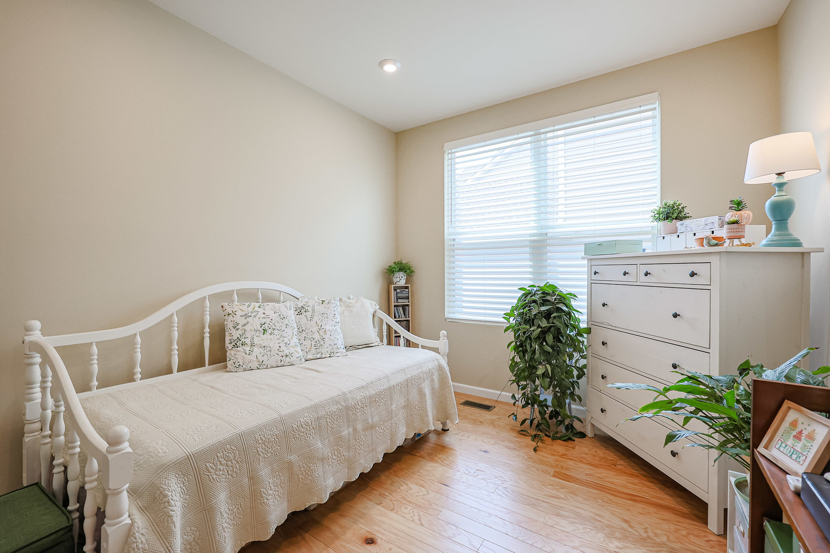 580 North Highlander Way Addison, IL 60101 - Photo 37 of 63 a bedroom with a bed table closet and windows