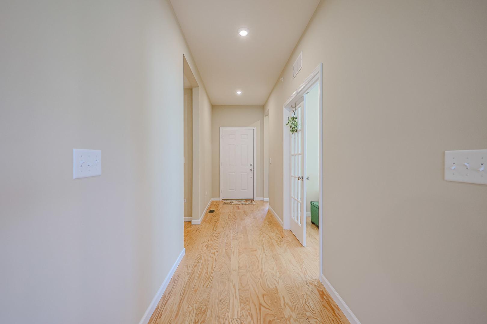 580 North Highlander Way Addison, IL 60101 - Photo 41 of 63 a view of hallway with wooden floor