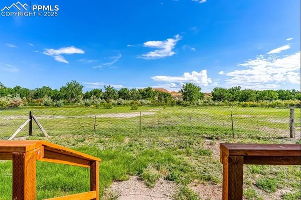 a view of a lake with a big yard