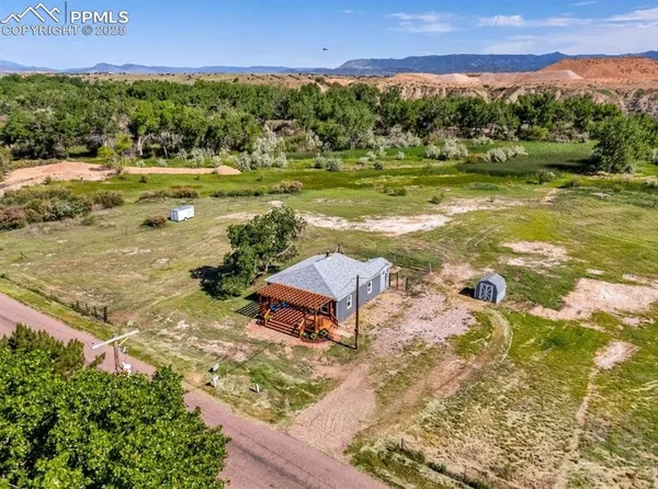 a view of a city with an ocean