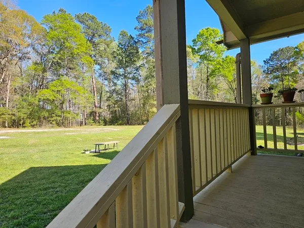 a view of swimming pool from a balcony