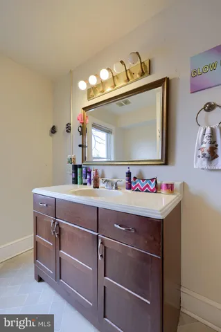 a room with cabinets and wooden floor