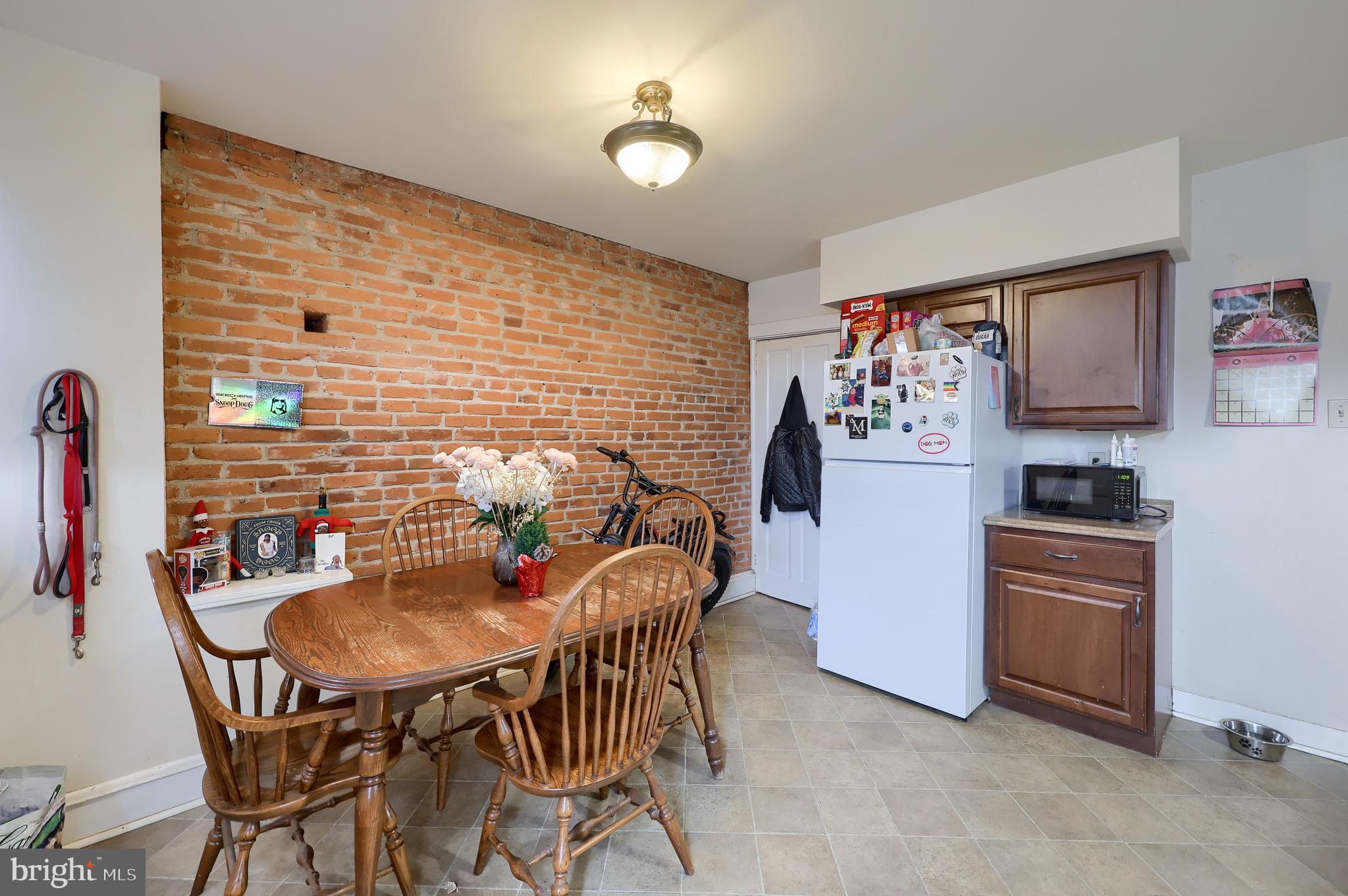 318 East Liberty Street Lancaster, PA 17602 - Photo 9 of 18 a dining room with furniture and window