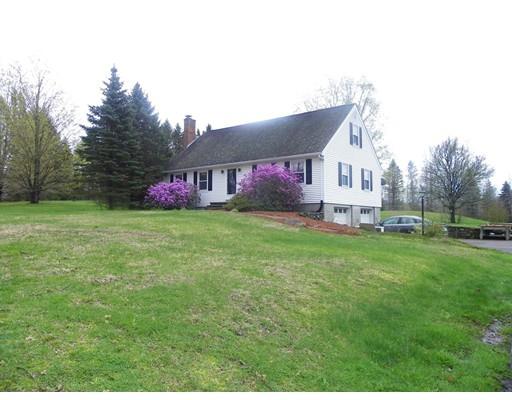 40 Wheeler Road Townsend, MA 01474 - Photo 3 of 27 a view of a house with a big yard and large trees