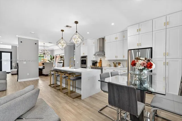 a bathroom with a bathtub a sink and a shower