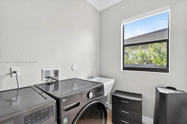 a view of house with swimming pool and yard