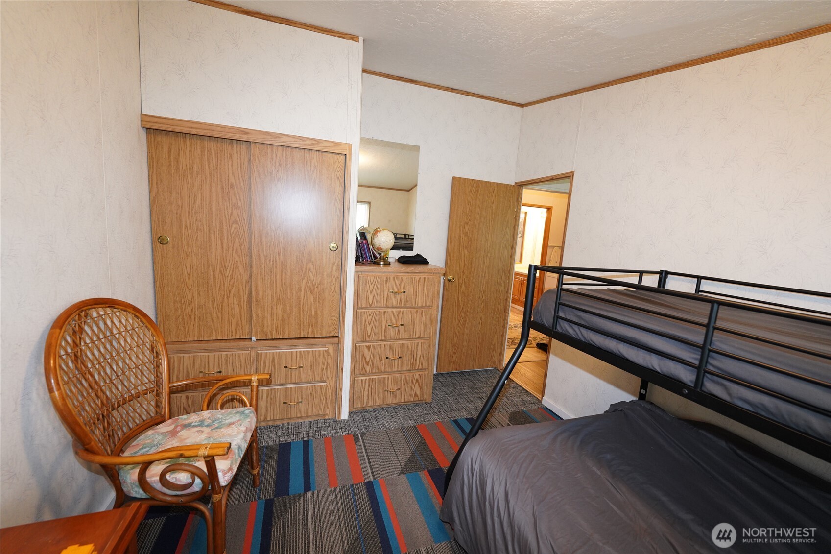 27509 Q Lane Ocean Park, WA 98640 - Photo 11 of 20 a living room with furniture and a wooden floor