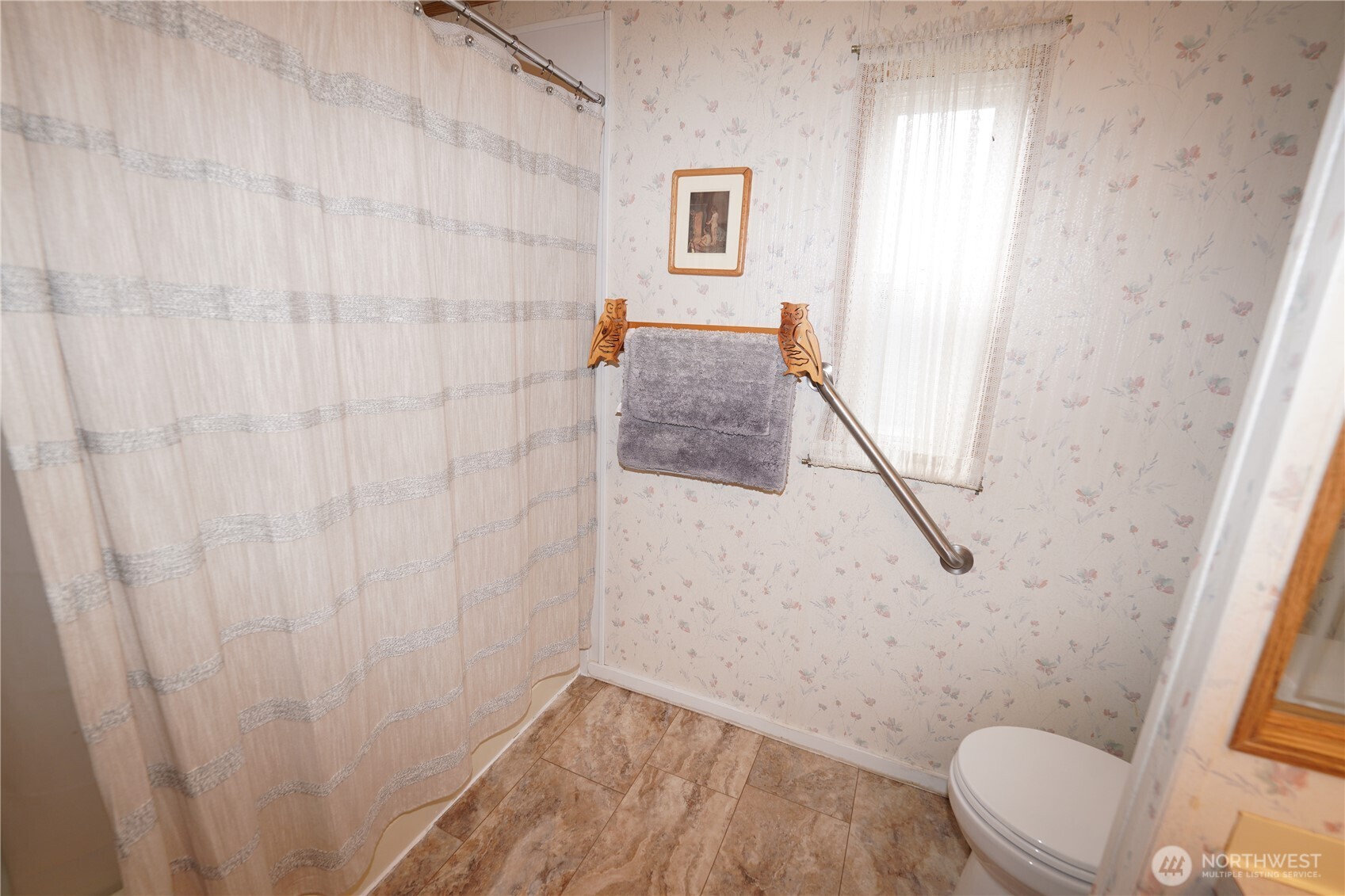 27509 Q Lane Ocean Park, WA 98640 - Photo 14 of 20 a bathroom with a granite countertop shower and a toilet