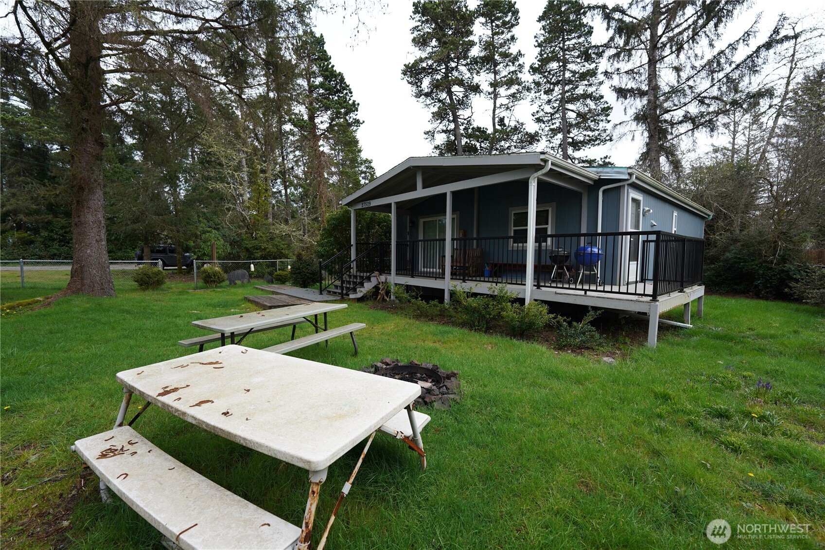 27509 Q Lane Ocean Park, WA 98640 - Photo 17 of 20 a view of a house with backyard and a garden