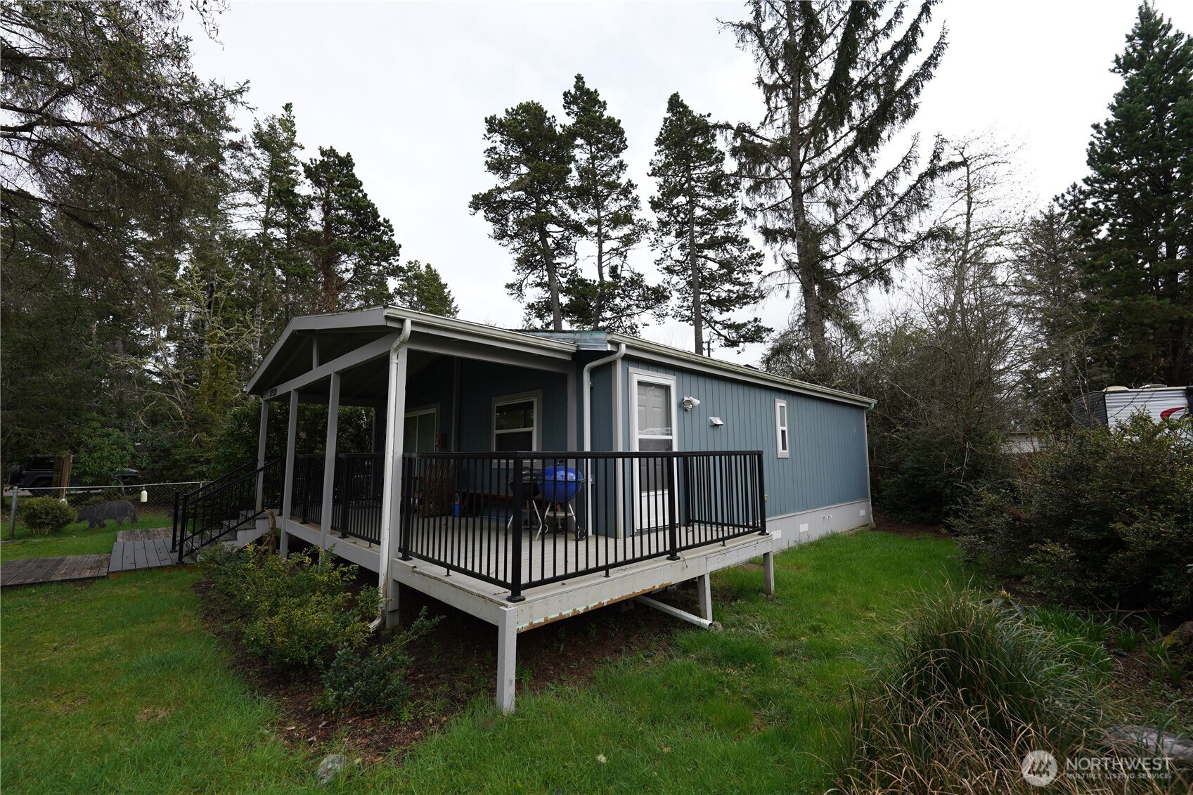 27509 Q Lane Ocean Park, WA 98640 - Photo 2 of 20 a view of backyard with deck and garden