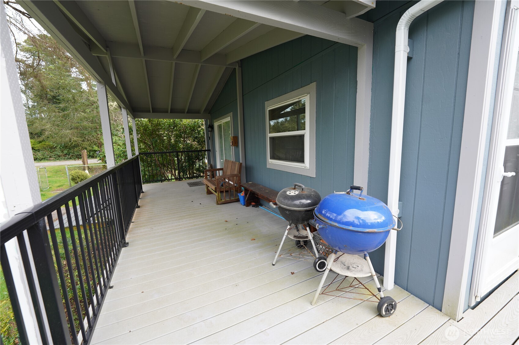27509 Q Lane Ocean Park, WA 98640 - Photo 3 of 20 a view of a porch with furniture and a yard