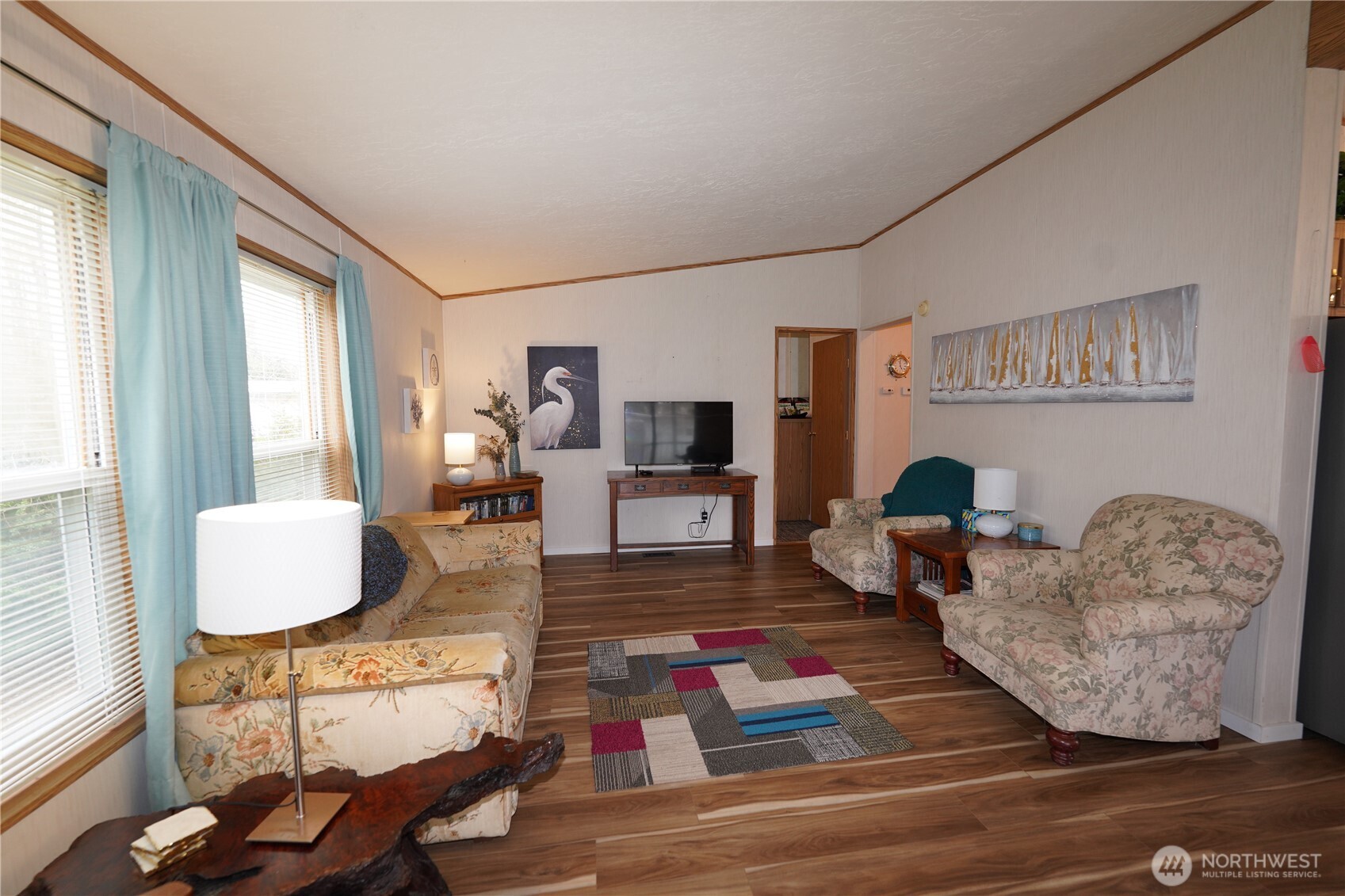 27509 Q Lane Ocean Park, WA 98640 - Photo 4 of 20 a living room with furniture and a wooden floor