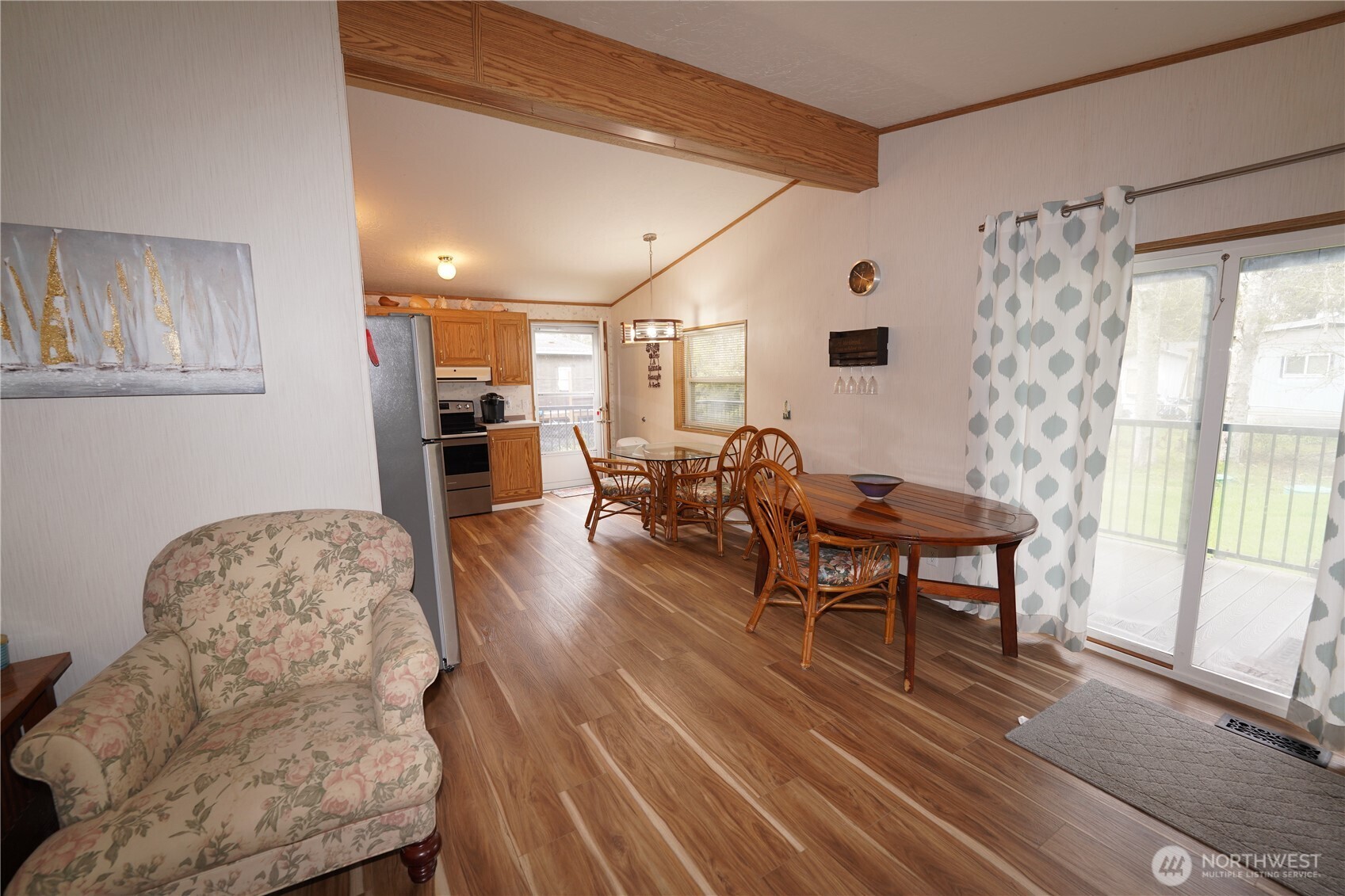 27509 Q Lane Ocean Park, WA 98640 - Photo 6 of 20 a living room with furniture and a table