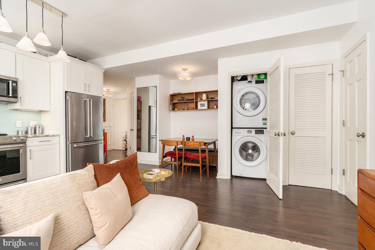 1930 18th Street Northwest, Unit 32 Washington, DC 20009 - Photo 11 of 17 a living room with furniture and a wooden floor