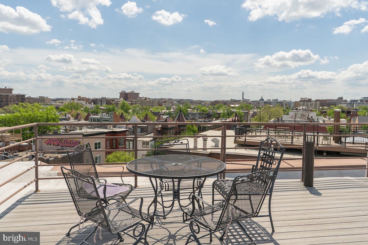 1930 18th Street Northwest, Unit 32 Washington, DC 20009 - Photo 16 of 17 a view of a terrace with furniture