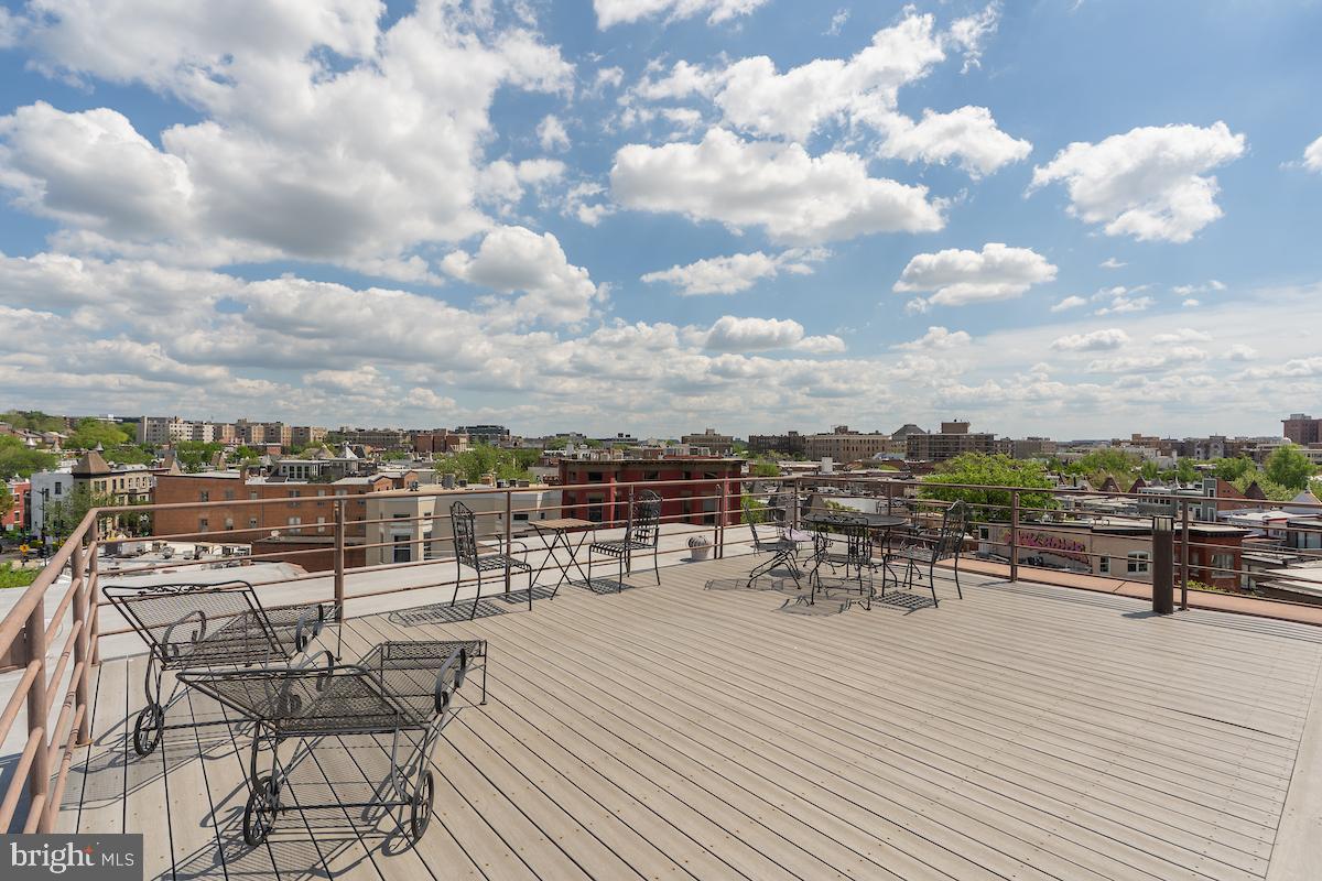1930 18th Street Northwest, Unit 32 Washington, DC 20009 - Photo 17 of 17 a view of a terrace with furniture