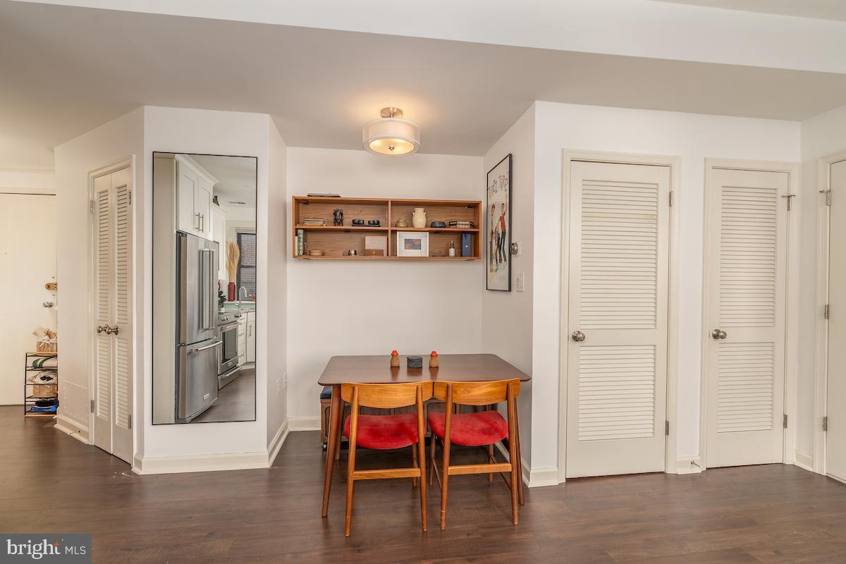 1930 18th Street Northwest, Unit 32 Washington, DC 20009 - Photo 7 of 17 a room with a table and chairs