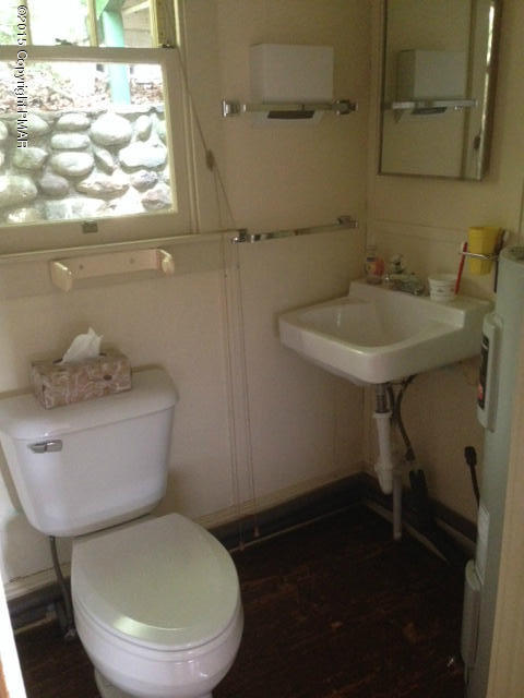 258 Echo Road Saylorsburg, PA 18353 - Photo 9 of 11 a bathroom with a toilet sink and mirror