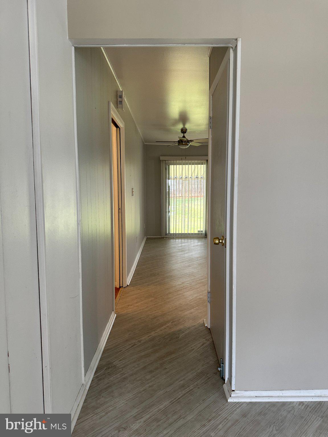 8336 Scotts Level Road Baltimore, MD 21208 - Photo 6 of 55 Inviting hallway with natural light.