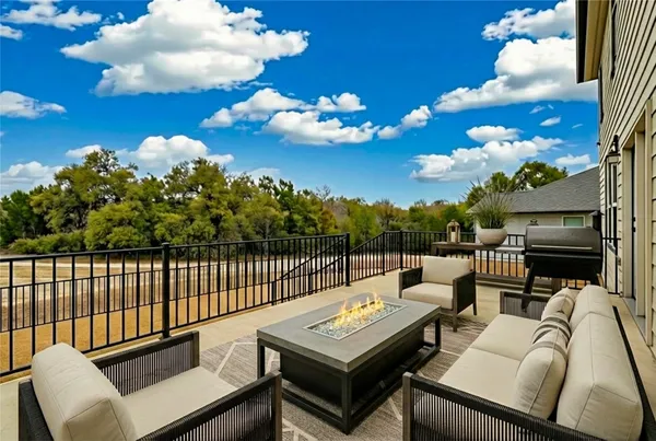 a view of a terrace with couches