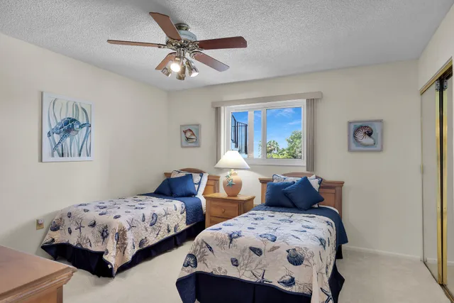 a bedroom with furniture and window