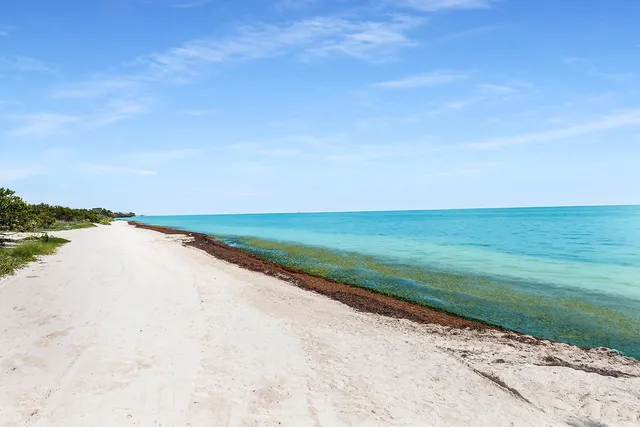 a sign that is on the side of the road