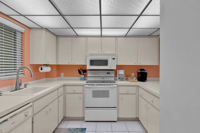 a view of counter top with kitchen