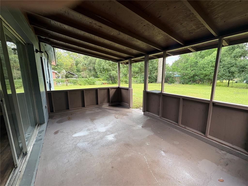1236 Northeast 22nd Street Ocala, FL 34470 - Photo 12 of 42 a view of an outdoor space with a large window