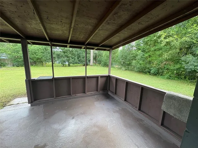 a view of hallway with natural light