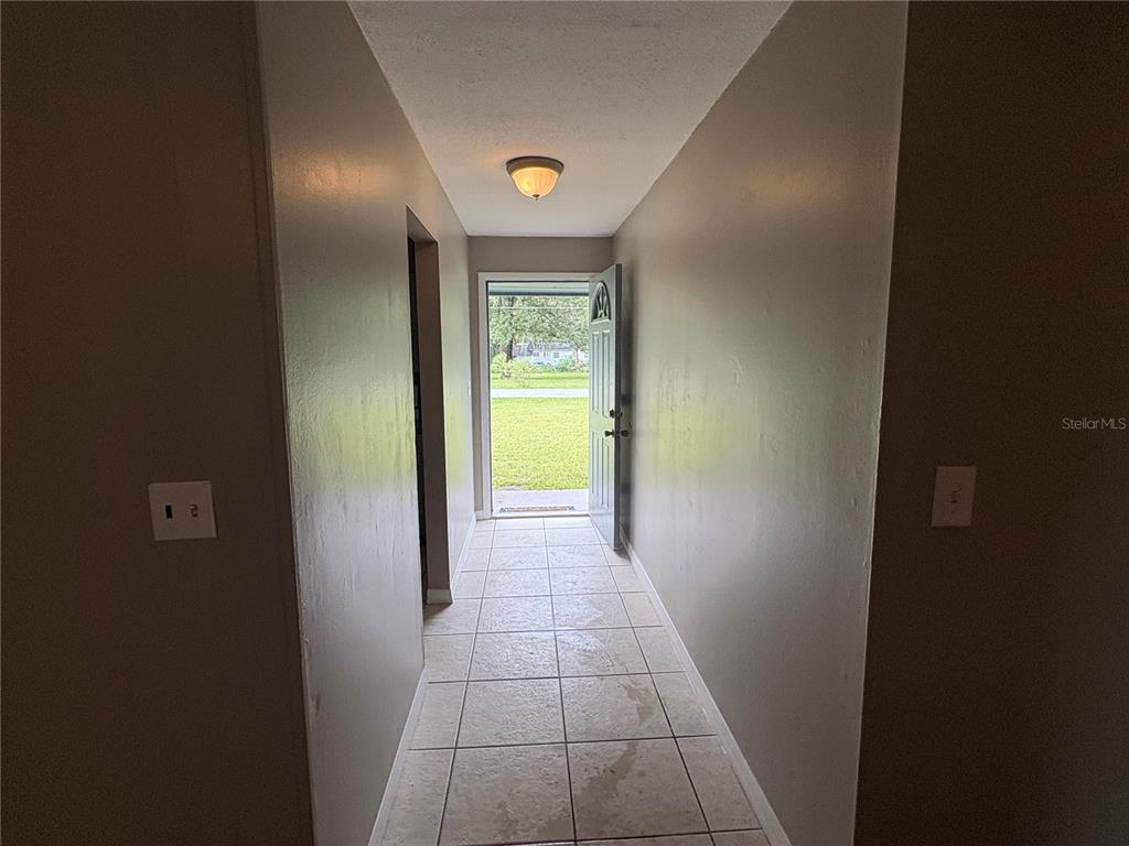 1236 Northeast 22nd Street Ocala, FL 34470 - Photo 15 of 42 a view of hallway with natural light