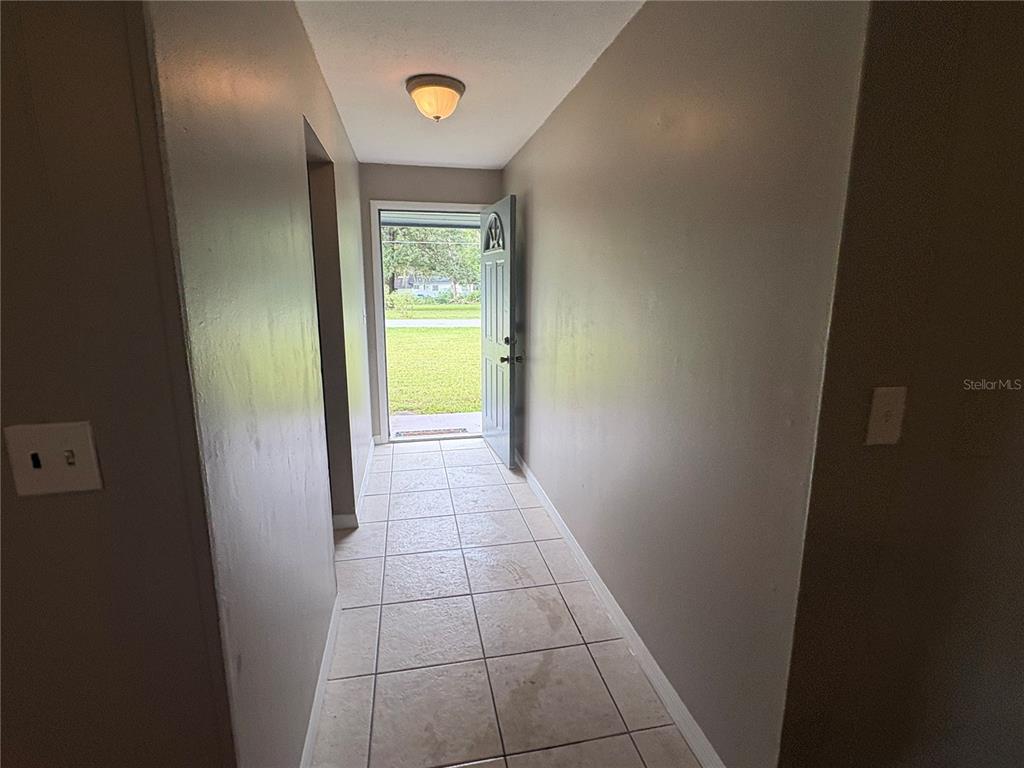 1236 Northeast 22nd Street Ocala, FL 34470 - Photo 16 of 42 a view of an empty room with closet and a window