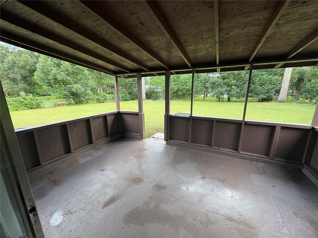 1236 Northeast 22nd Street Ocala, FL 34470 - Photo 32 of 42 a view of an outdoor space with a large window