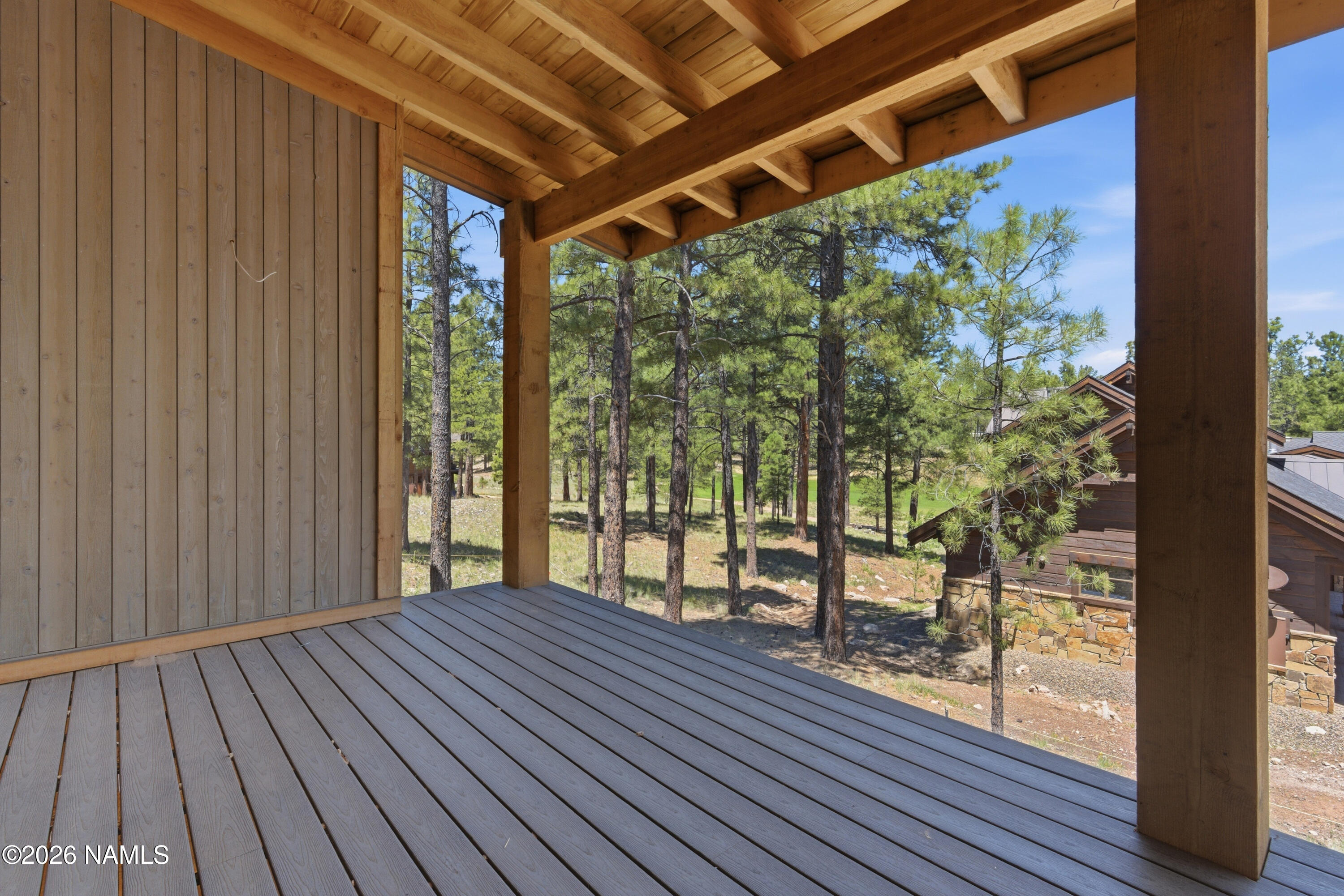 2380 East Del Rae Drive Flagstaff, AZ 86005 - Photo 23 of 26 a view of porch with wooden floor